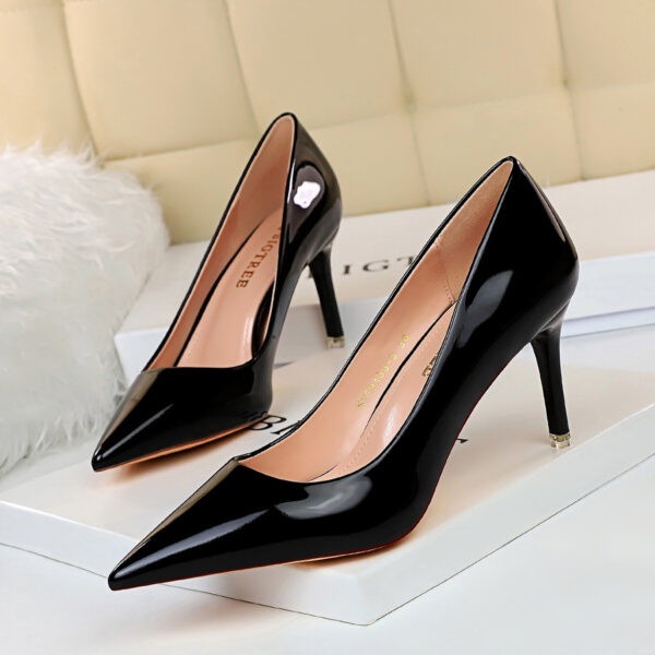 Make a statement with our Metal Heel High Heels. Low cut, pointed toe, and metal heel for a glamorous night-out look.
