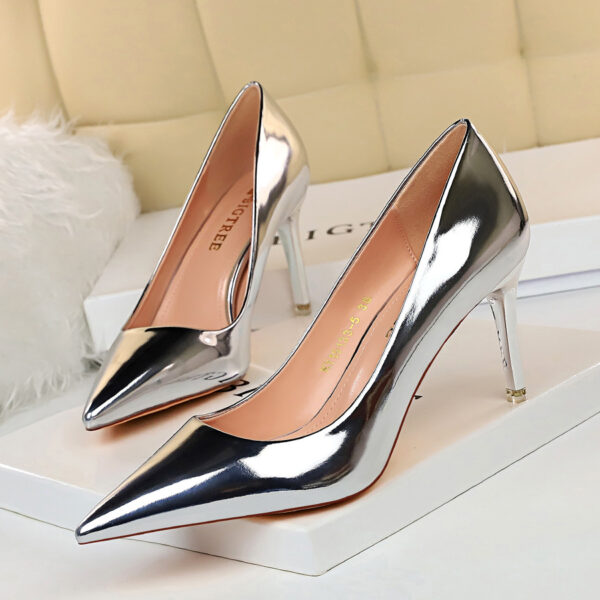 Make a statement with our Metal Heel High Heels. Low cut, pointed toe, and metal heel for a glamorous night-out look.