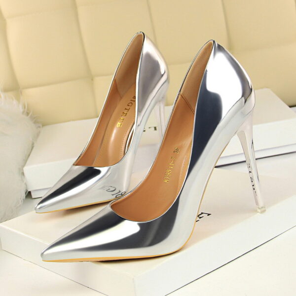 Make a statement with our Metal Heel High Heels. Low cut, pointed toe, and metal heel for a glamorous night-out look.