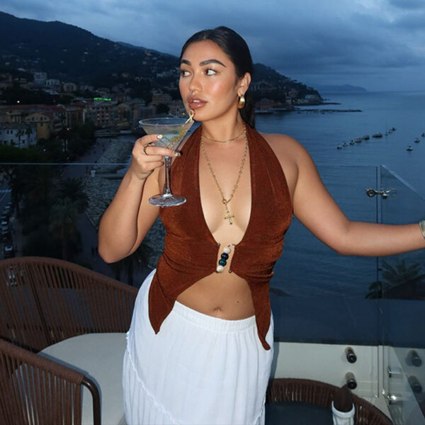 Sexy solid color halter vest with a tight fit. Ideal for chic outfits. Comfortable, confident, and stylish.