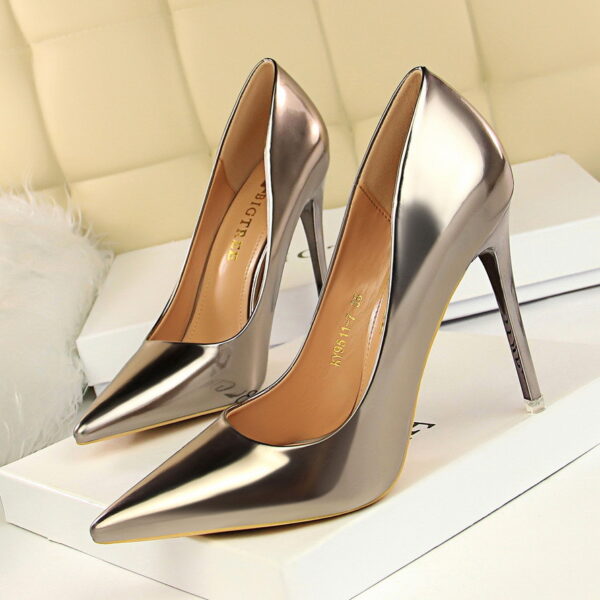 Make a statement with our Metal Heel High Heels. Low cut, pointed toe, and metal heel for a glamorous night-out look.