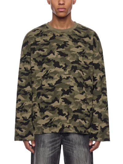 Model wearing AstonSienna Camo Waffle Raw Edge Long Sleeve Tee with oversized streetwear fit and camouflage waffle texture